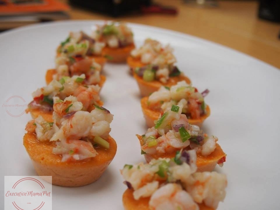 Baked in an oven using a bain-marie and topped with stir-fried prawns.