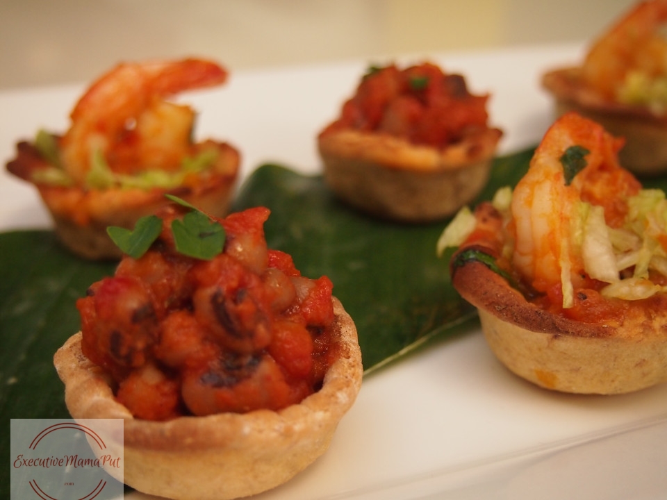 Plantain cups filled with beans and prawns